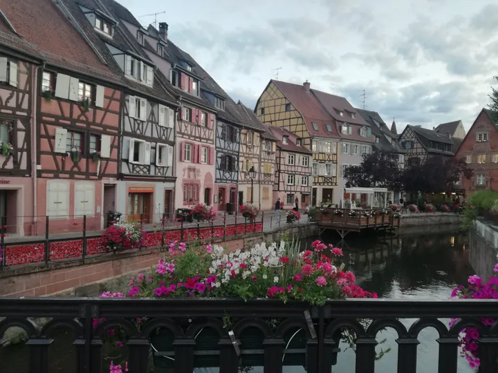 Folklore dancing in the evening at Colmar, Alsace (France)